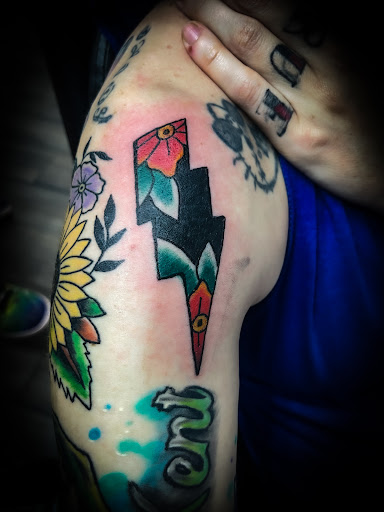 Explore koi fish tattoo ideas, creative tattoo ideas in Gadsden, available at Zekez Inkz Tattoos & Piercings