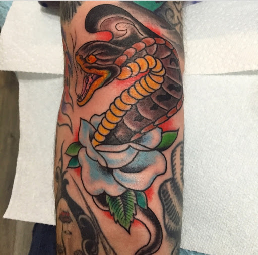 Explore german shepherd tattoo ideas, creative tattoo ideas in Frisco, available at Frisco Tattoo Company - Steel PaintBrush