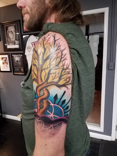 Explore memorial sleeve tattoo ideas, creative tattoo ideas in Troy, available at The Ink Spot