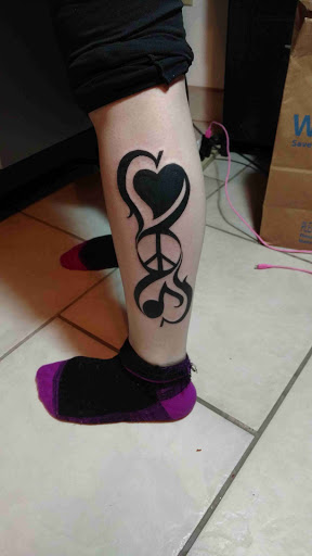 Explore spinal tattoo ideas, creative tattoo ideas in Espanola, available at Daydreamer Tattoo