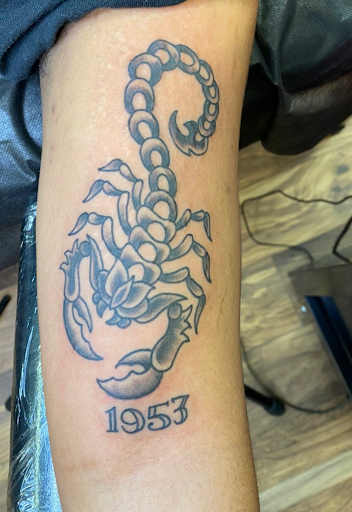 Explore men's inner bicep tattoo ideas, creative tattoo ideas in Baltimore, available at Rippd Canvas Tattoo Shop Artists Social Club