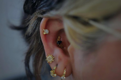 Find tattoo promo ideas for your next unique tattoo in Toledo at Piercings by Caitlin presents Holier Toledo