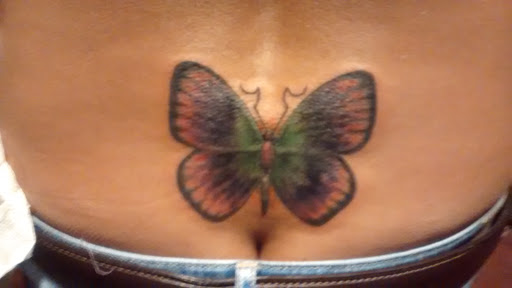 Explore snake tattoo ideas for guys, creative tattoo ideas in Cherokee, available at Indian Ink Tattoo Studio