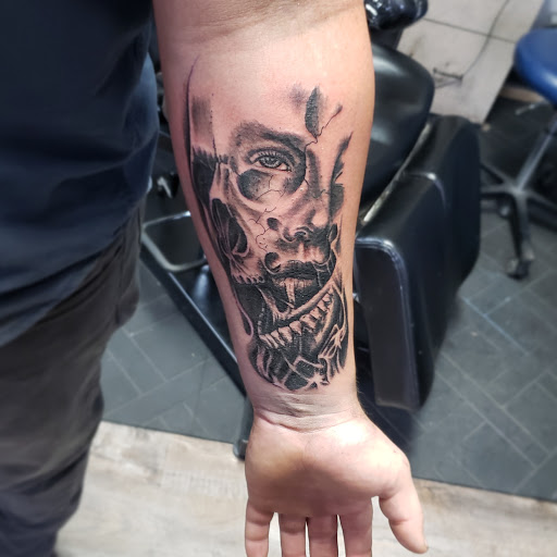 Tattoo Shop «Next Level Tattoo Company - Imlay City», reviews and photos, 420 E 3rd St, Imlay City, MI 48444, USA