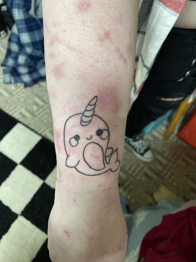 Find between the breast tattoo ideas for your next unique tattoo in Puyallup at Inflictions Tattoos and Piercings