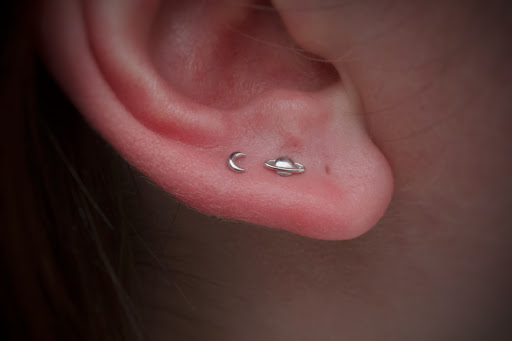 Explore catholic tattoo ideas, creative tattoo ideas in Corona Del Mar, available at Rainbow Piercing & Jewelry