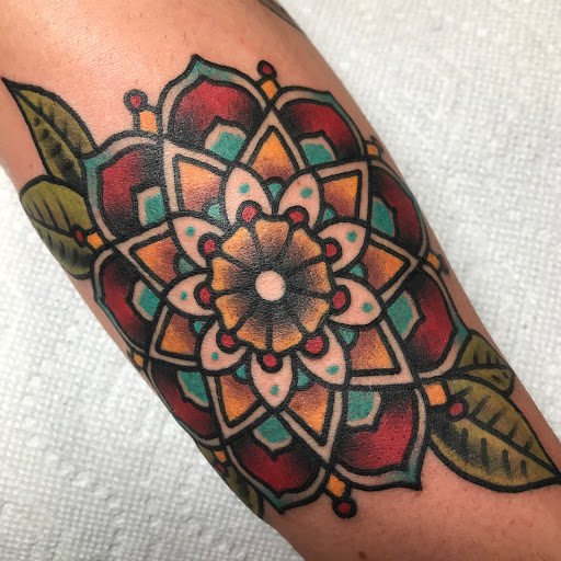 Explore athlete tattoo ideas, creative tattoo ideas in Hendersonville, available at Revival Tattoo Company