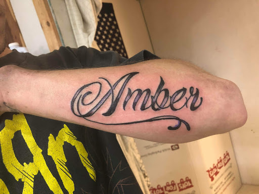 Explore side tattoo ideas, creative tattoo ideas in Paris, available at Twizted Dezignz