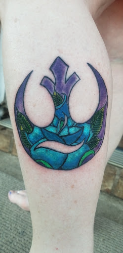 Explore tribal dragon tattoo ideas, creative tattoo ideas in Meridian, available at SK-Tattoo1
