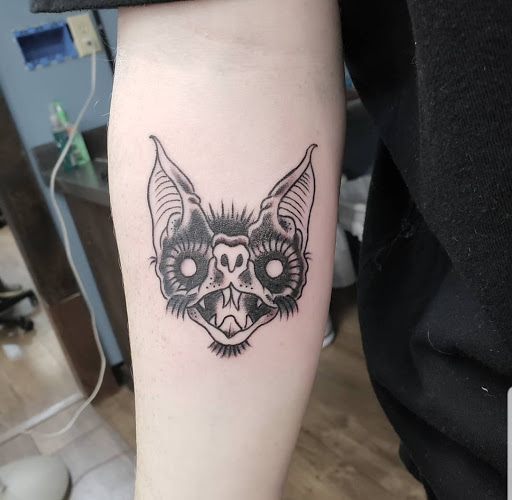 Explore neptune tattoo ideas, creative tattoo ideas in Sioux Falls, available at Permanent Addictions