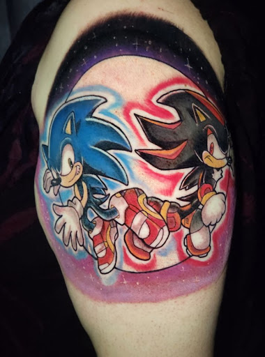 Explore super mario tattoo ideas, creative tattoo ideas in Buford, available at Inked Arts Tattoo Studio