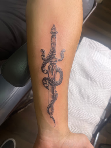 Explore tattoo fill in ideas for men, creative tattoo ideas in Cleveland, available at NBA tattoo