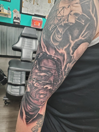 Explore religious elbow tattoo ideas, creative tattoo ideas in Saint Charles, available at Sink or Swim Tattoo