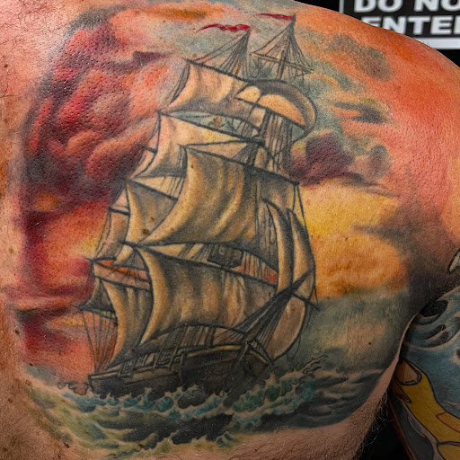 Explore wrap around tattoo ideas, creative tattoo ideas in Augusta, available at Mr. Tattoo