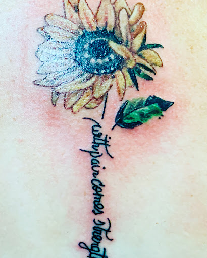 Explore aster flower tattoo ideas, creative tattoo ideas in Valley Park, available at Full Spectrum Tattoo