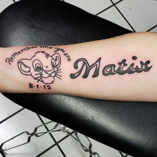 Explore tattoo ideas for the back of the neck, creative tattoo ideas in Erie, available at EliKingInk