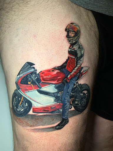 Explore dark skin male black skin tattoo ideas, creative tattoo ideas in Greensboro, available at Tried and True Tattoo Company