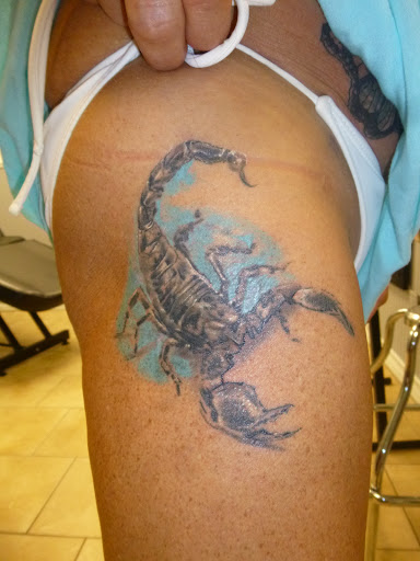 Tattoo Shop «magnum opus tattoo company», reviews and photos, 1817 Padre Blvd #4, South Padre Island, TX 78597, USA