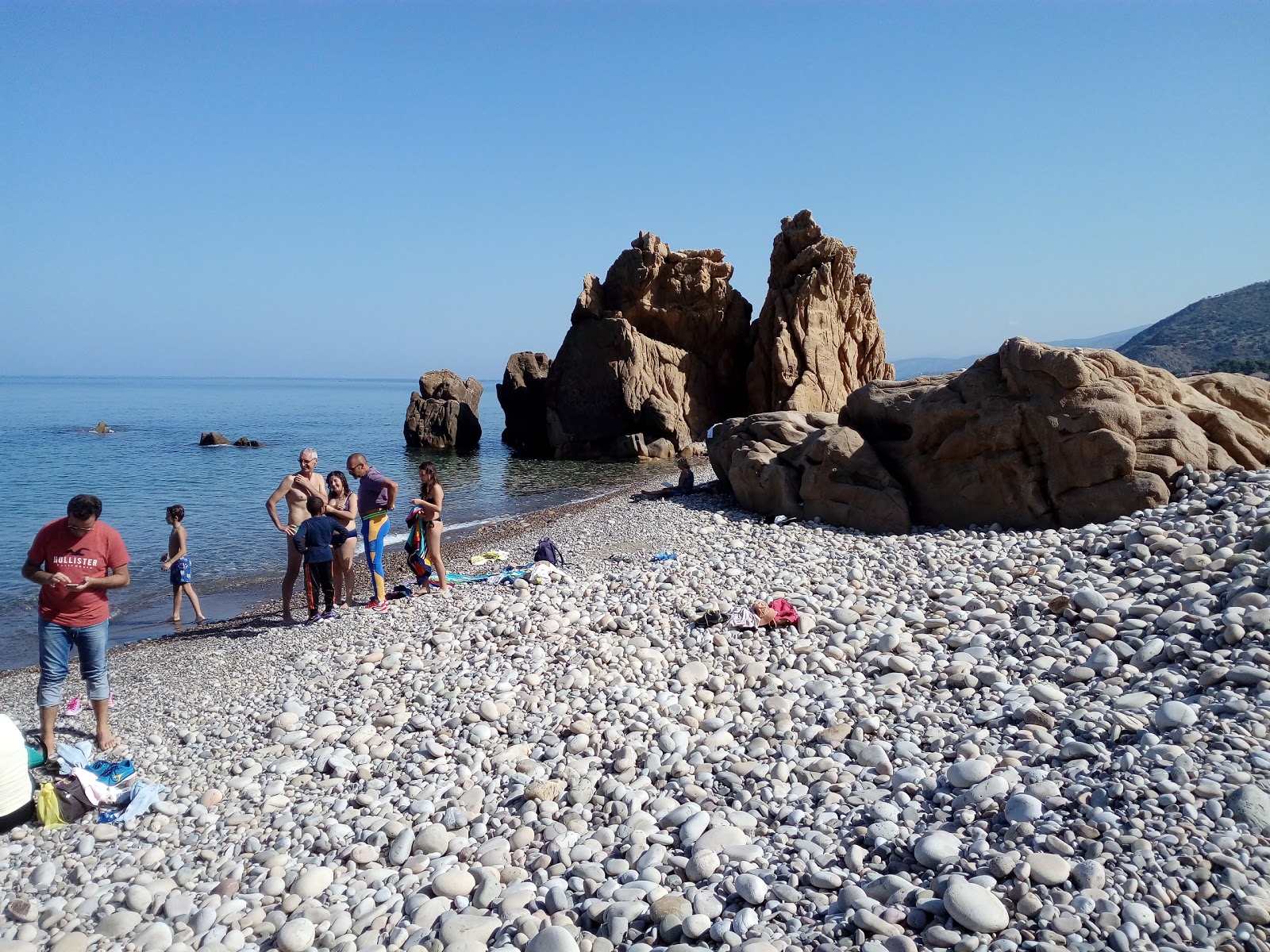 Foto von Lampare beach und die siedlung