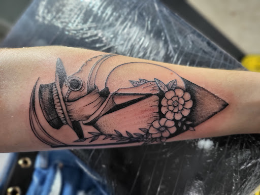 Explore hand poke tattoo ideas, creative tattoo ideas in Carrollton, available at Neeces UniqueINK