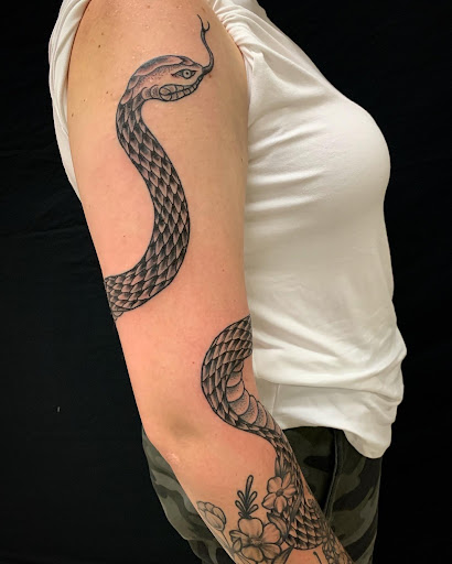 Explore dog portrait tattoo ideas, creative tattoo ideas in Strasburg, available at Champion Tattoo Company