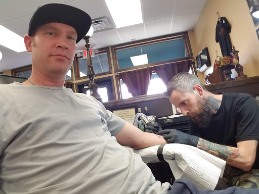 Explore hour glass tattoo ideas, creative tattoo ideas in Saint Paul Park, available at Lady Liberty Tattoo
