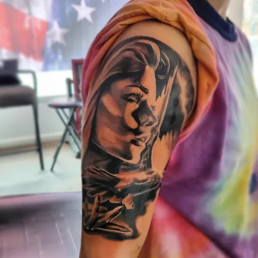 Explore fairy tattoo ideas, creative tattoo ideas in Medina, available at Greasers Ink