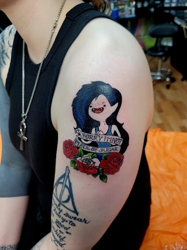 Explore star tattoo cover up ideas, creative tattoo ideas in Benton, available at Spectrum Tattoo