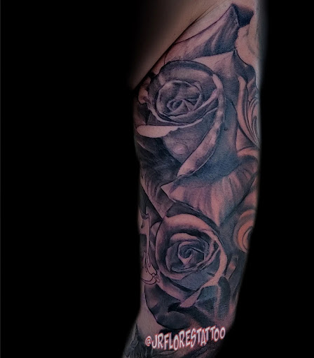 Explore tramp stamp lower back tattoo cover up ideas, creative tattoo ideas in Caldwell, available at Blue Ring Studio Tattoo & Piercing