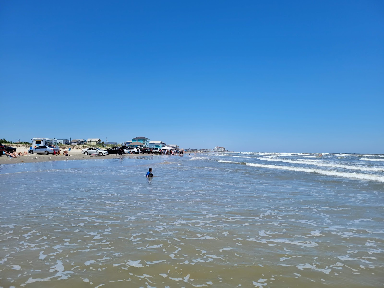 Φωτογραφία του Galveston beach - συνιστάται για οικογένειες που ταξιδεύουν με παιδιά