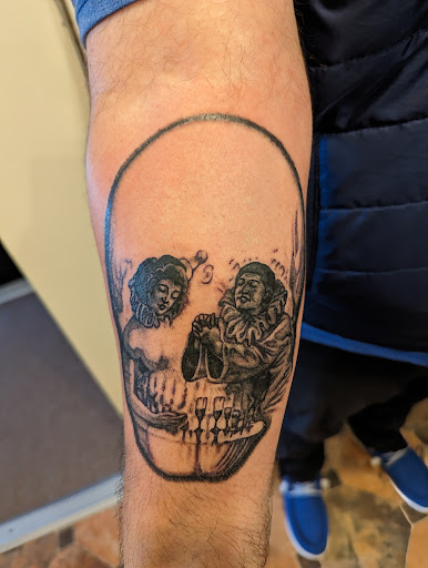 Explore women's lower back tattoo ideas, creative tattoo ideas in Hebron, available at Explosive Ink Tattoo