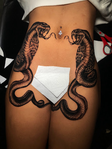 Explore trust tattoo ideas, creative tattoo ideas in Atlanta, available at Iron Palm Tattoos & Body Piercing Atlanta