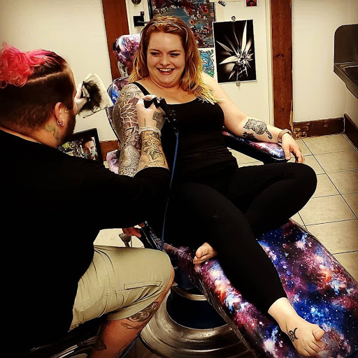 Explore family heart tattoo ideas, creative tattoo ideas in Edinboro, available at Tattarrattat Body Art Studio