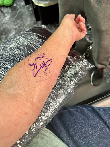 Explore august birth flower tattoo ideas, creative tattoo ideas in Dayton, available at Uppity Tattoos