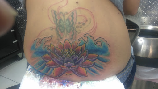 Explore purple heart tattoo ideas, creative tattoo ideas in Ormond Beach, available at Tropical Tattoo Inc