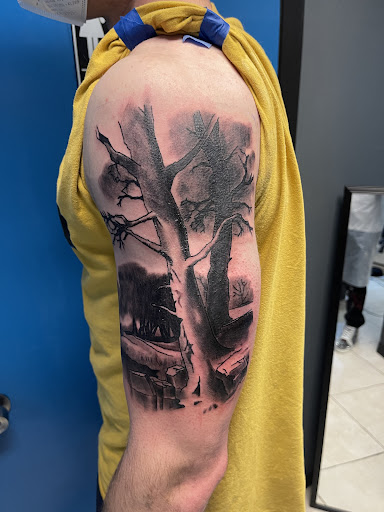 Explore lower back tattoo cover up ideas, creative tattoo ideas in Largo, available at Ink Godz Tattoo 2