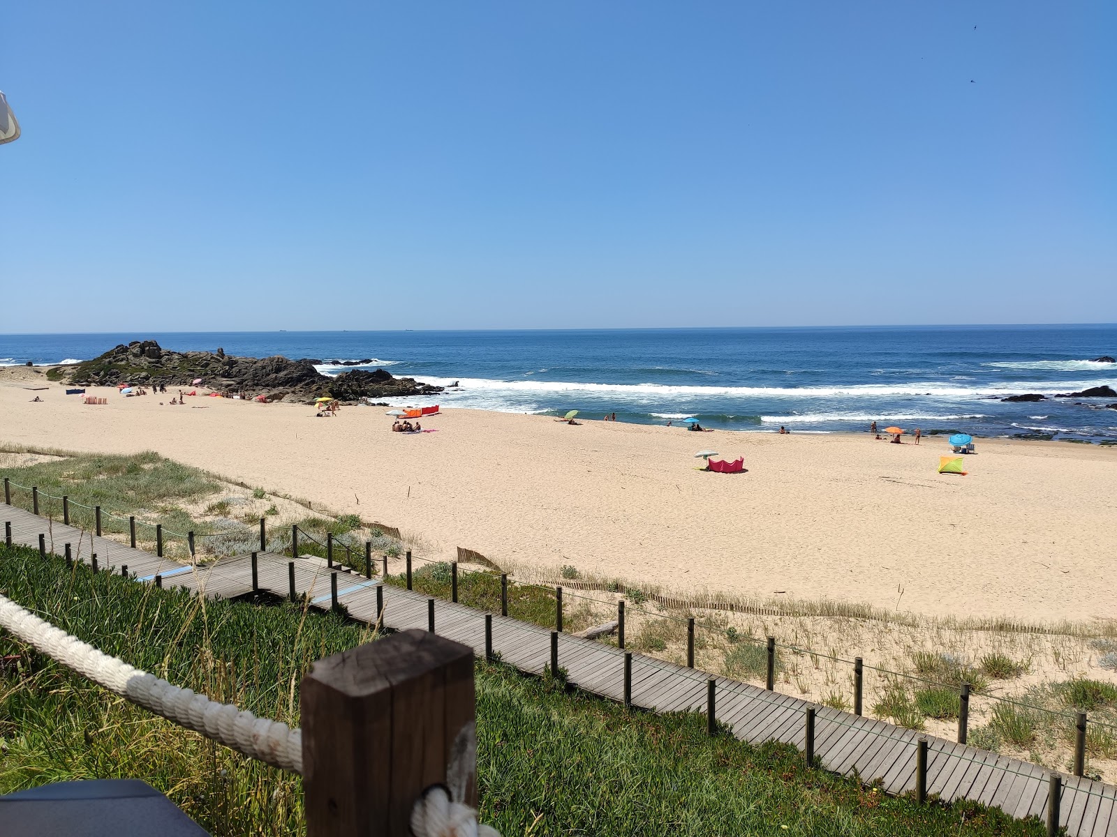 Fotografie cu Praia do Aterro cu drept și lung