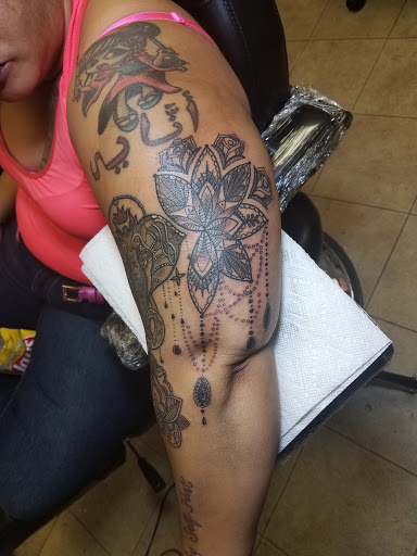 Tattoo Shop «Tattoo Mayhem», reviews and photos, 1510-A Castle Hill Ave, Bronx, NY 10462, USA