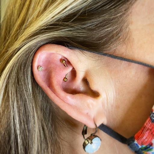 Find mexican american flag tattoo ideas for your next unique tattoo in Louisburg at Purple Dot Piercings