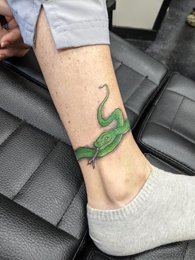 Find family meaning tattoo ideas for your next unique tattoo in Slippery Rock at Dinky Dachshund Tattoo Parlor