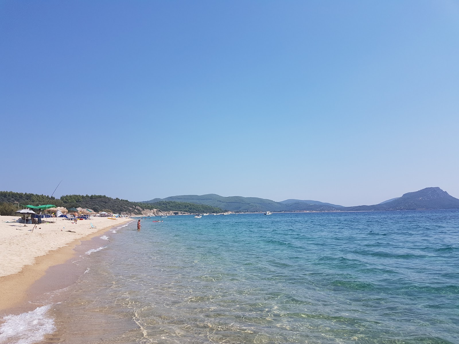 Photo of Tristinika beach with blue pure water surface