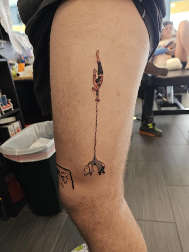 Explore flag tattoo ideas, creative tattoo ideas in Palm Harbor, available at Angry Owl Tattoo and Piercing