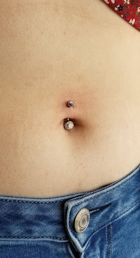 Explore shoulder tribal tattoo ideas, creative tattoo ideas in Marysville, available at Hawaiian Touch Piercing Co.