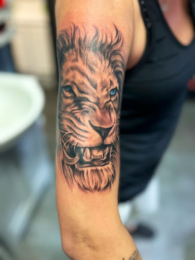 Explore collarbone tattoo ideas for guys, creative tattoo ideas in Navarre, available at Eleven 11 Tattoo Studio