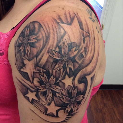 Explore band tattoo ideas, creative tattoo ideas in Seymour, available at American Gypsy Tattoo Corp.