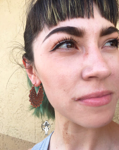 Explore red and black tattoo ideas, creative tattoo ideas in El Paso, available at Fox Labyrinth Body Piercing and Fine Jewelry