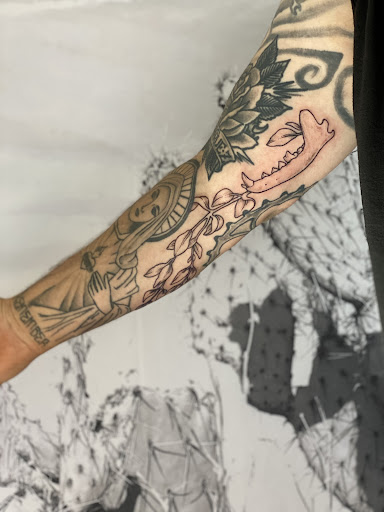 Explore smiley face tattoo ideas, creative tattoo ideas in Carefree, available at Lucid Arts - Design & Tattoo