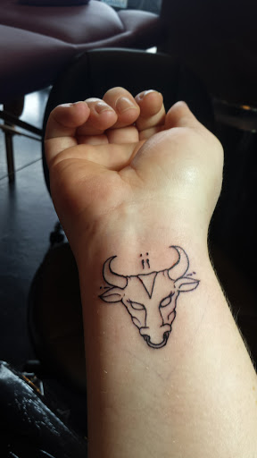 Explore lucky penny tattoo ideas, creative tattoo ideas in Auburn, available at Action Tattoo