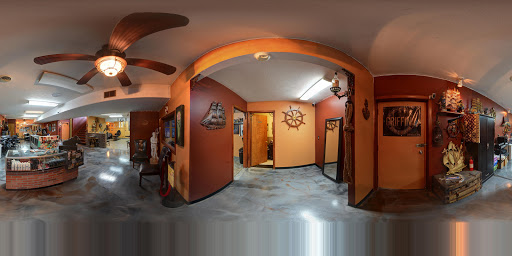 Explore under breast tattoo ideas for females, creative tattoo ideas in Charleston, available at Poor Boys Tattoo, LLC