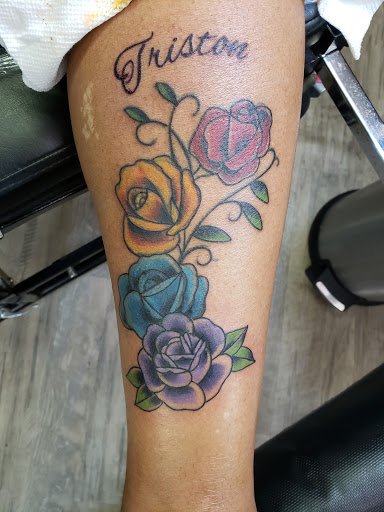 Explore one piece tattoos ideas, creative tattoo ideas in Leesville, available at Revolution Ink Tattoo and Art Gallery